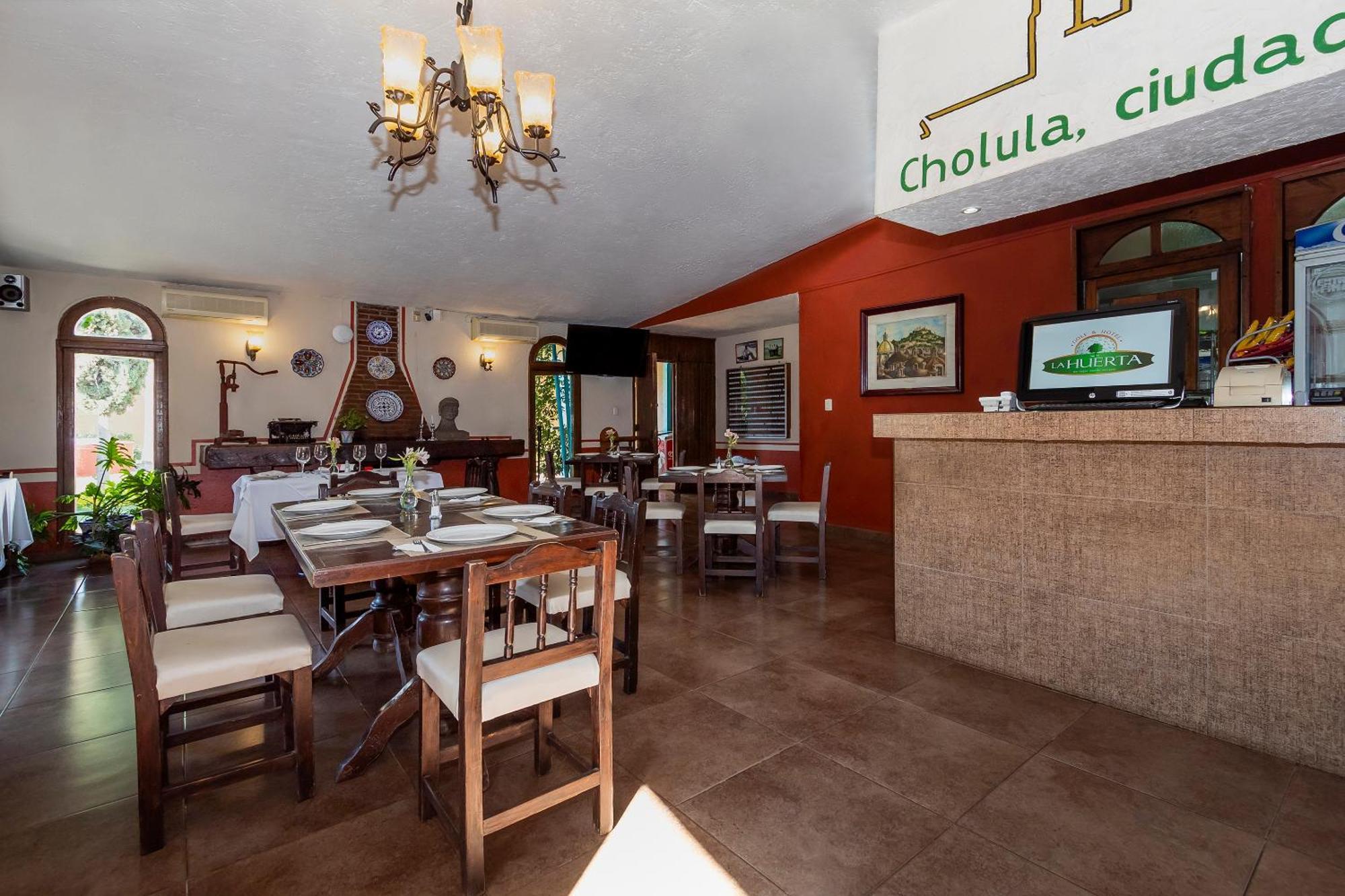 Capital O La Huerta Golf & Hotel Cholula Extérieur photo