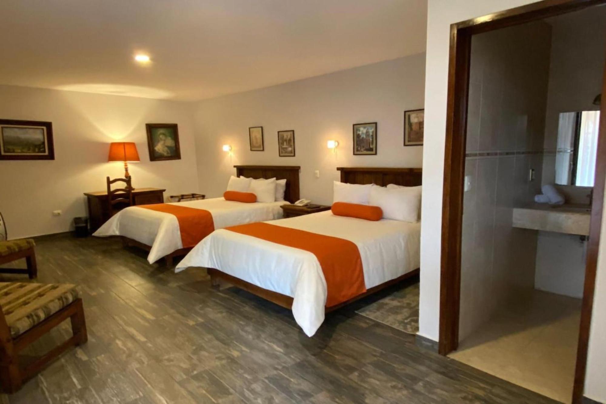 Capital O La Huerta Golf & Hotel Cholula Extérieur photo