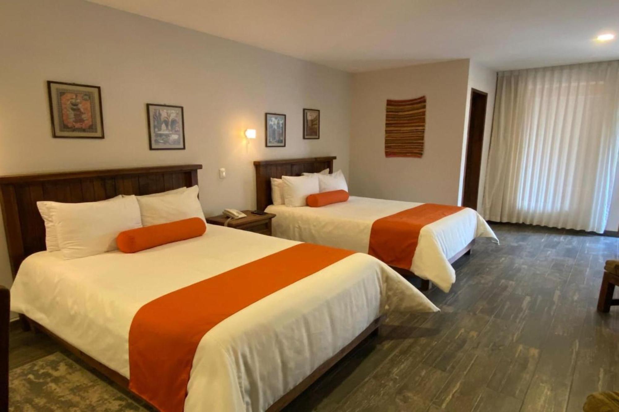 Capital O La Huerta Golf & Hotel Cholula Extérieur photo