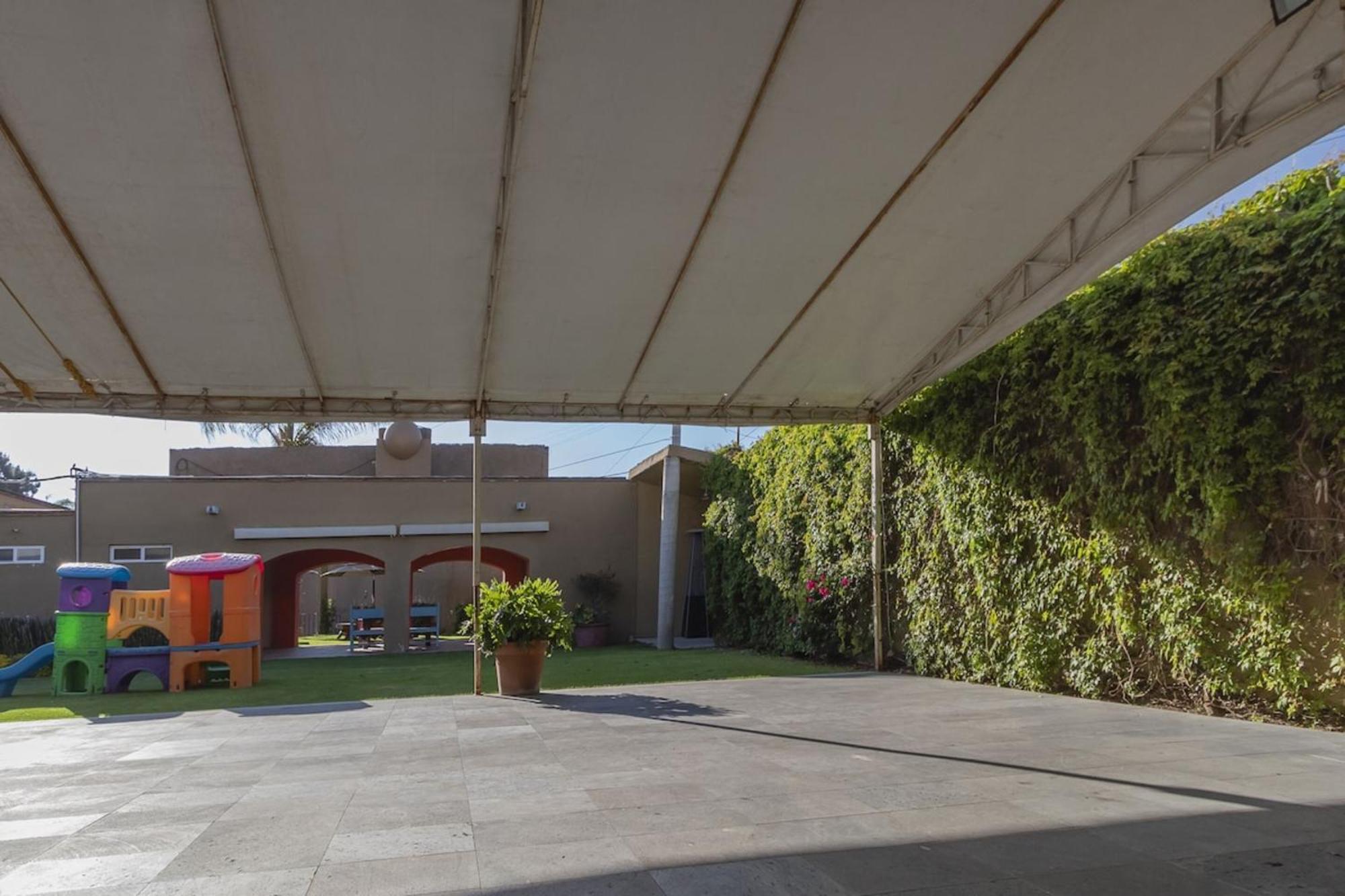 Capital O La Huerta Golf & Hotel Cholula Extérieur photo